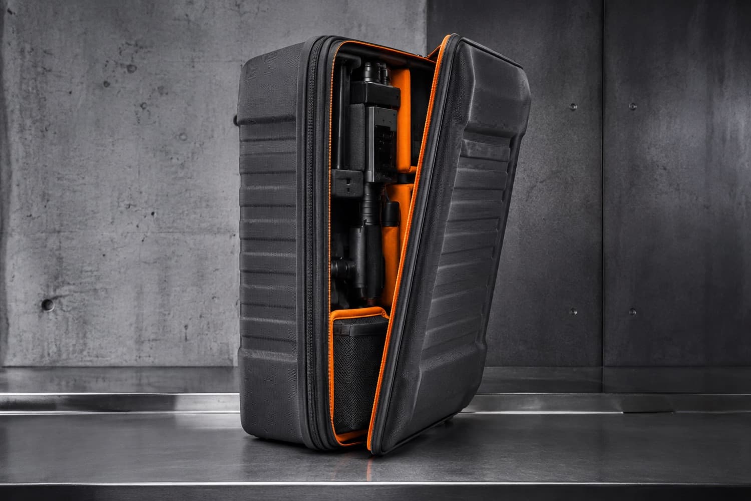 A case at an inspection bench with only its cover's access zipper opened.